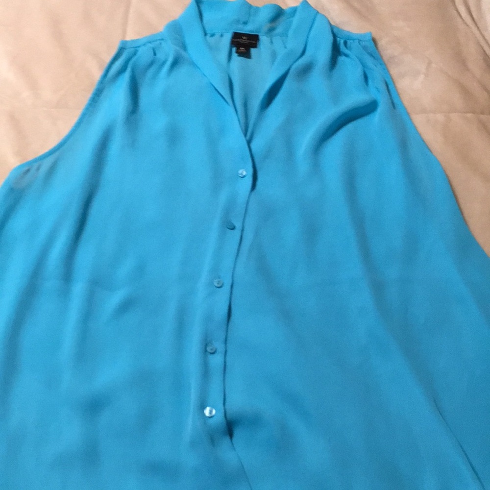 Light turquoise button down sleeveless dress shirt